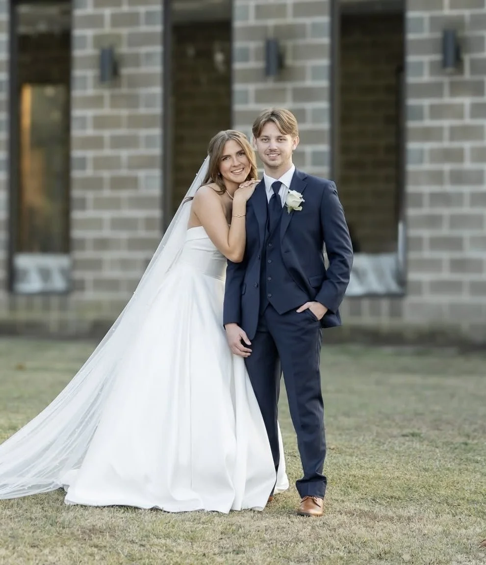 Kayson Langford, founder of Eden Roofing, with his wife